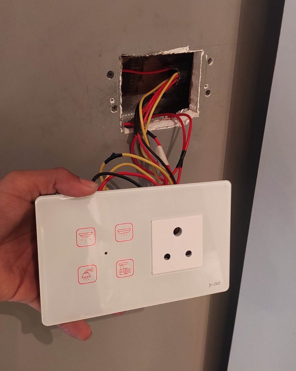 Panel being fitted to the existing back box and wiring