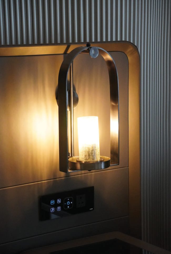 Prism panel beside a bed at night